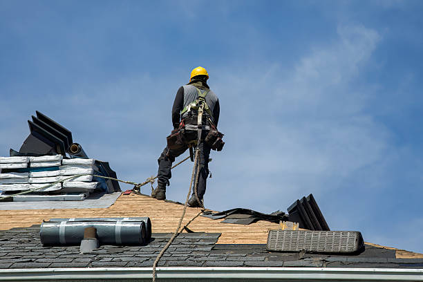 Professional Roof Replacement technician working in East Hampton, CT